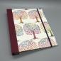 Preview: Buch Ringmechanik Baummotiv rot bunt